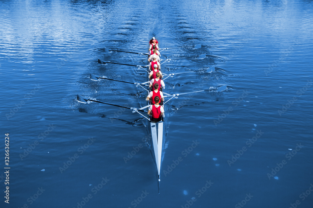 Rowing eight — perfect synchronization moving in a single direction